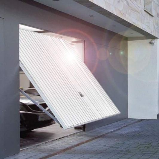 PORTE DE GARAGE BASCULANTE DÉBORDANTE AVEC RAILS